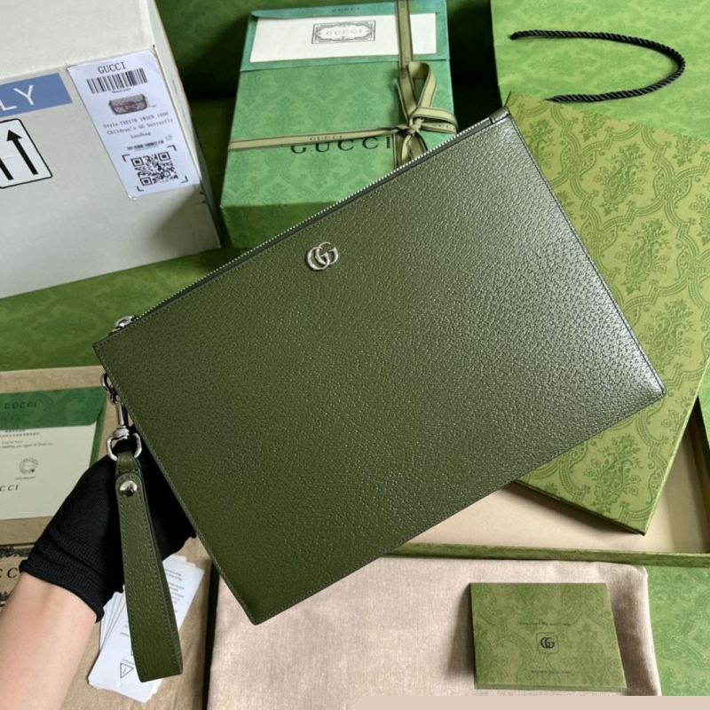 G*u*i clutch bags